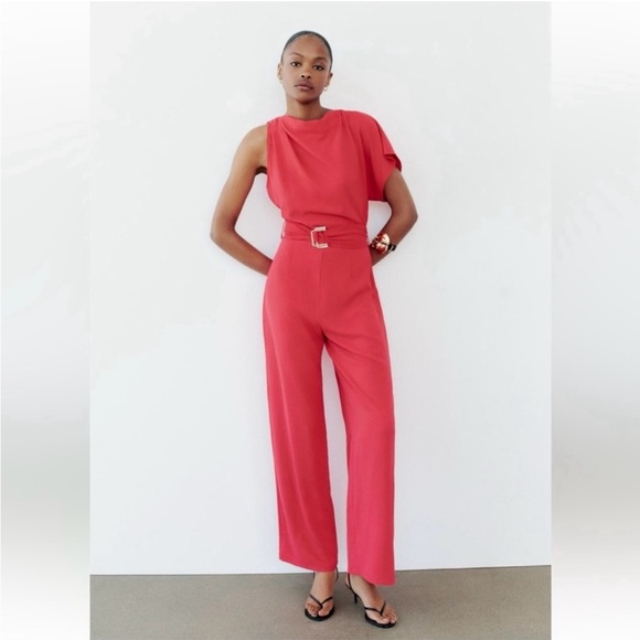 ASYMMETRIC CREPE BUCKLE JUMPSUIT
RED / CORAL . SIZE M, L - Picture 4 of 16